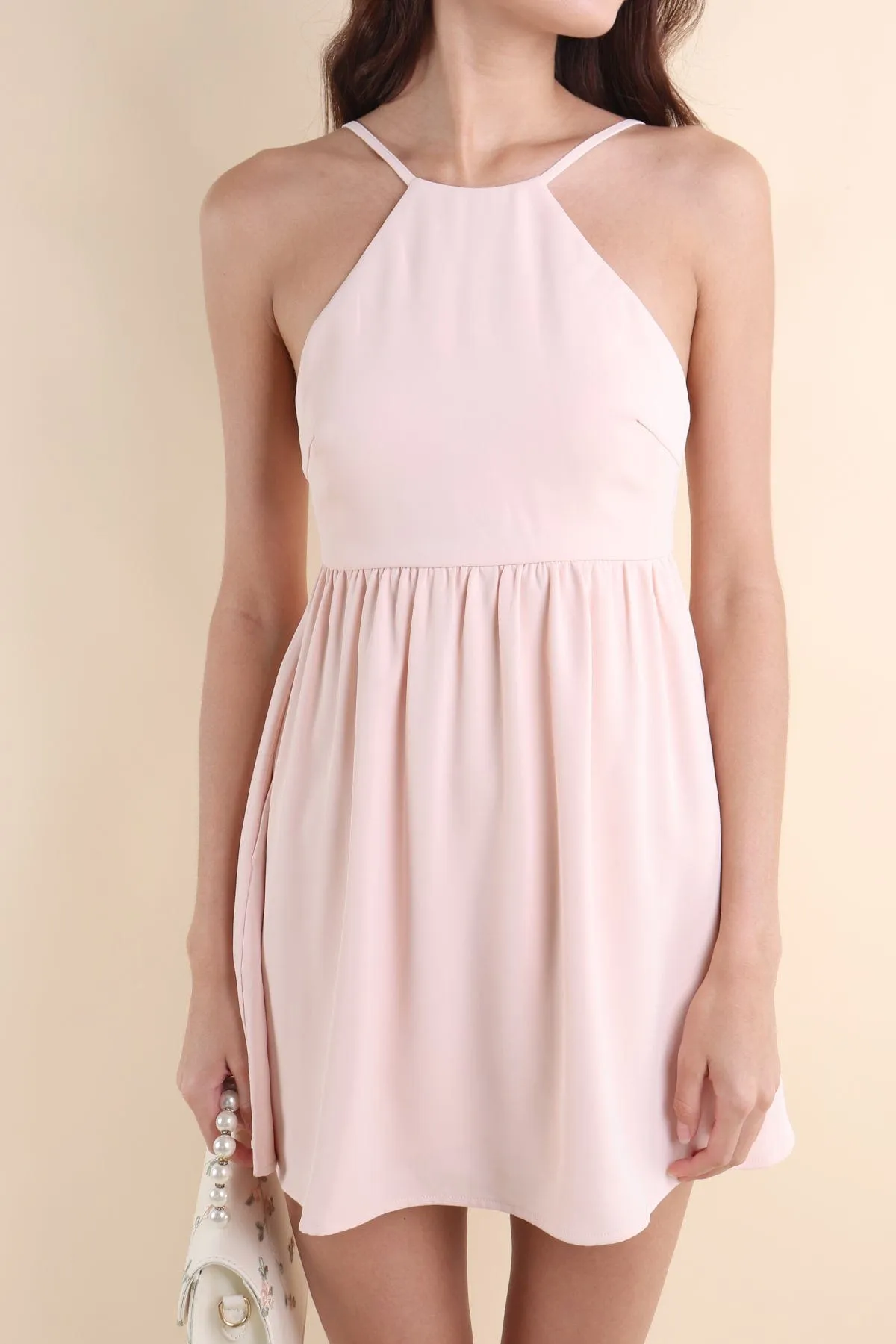 JEMMA HALTER LOW-BACK DRESS IN PINK